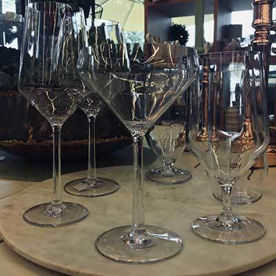 Display of 6 different stemware glasses for different beverages - Champagne, Red Wine, White Wine, etc.