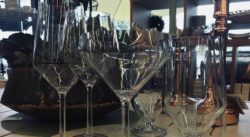 Display of 6 different pieces of stemware used for different beverages.